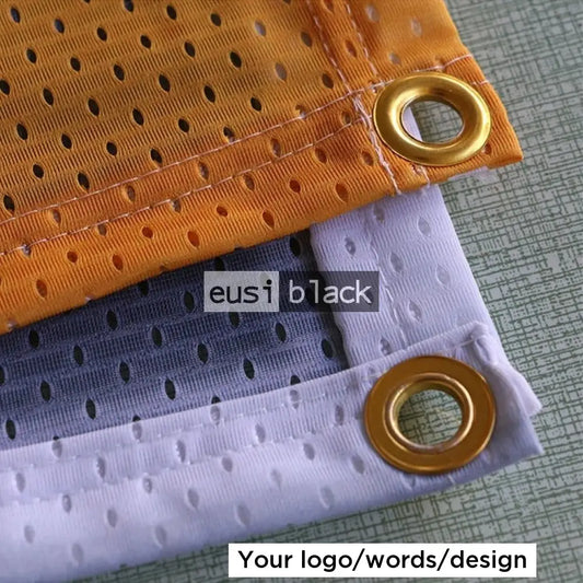 Eyelet cut mesh fence banner