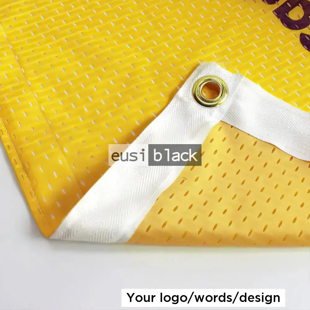 Eyelet cut mesh fence banner