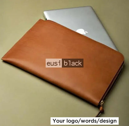 Strapped leather laptop sleeve