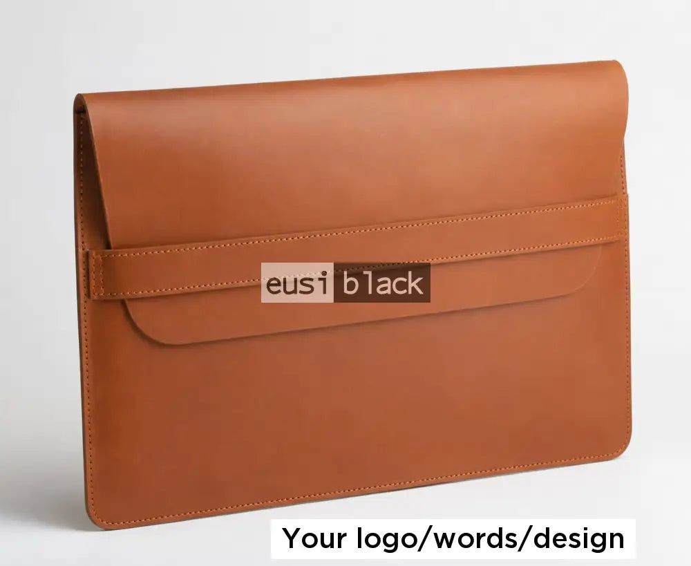 Strapped leather laptop sleeve