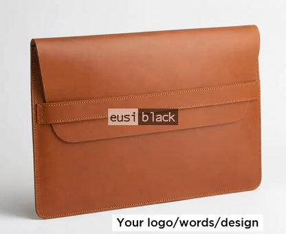 Strapped leather laptop sleeve